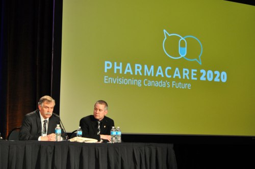 Jim Keon and Jody Shkrobot protect their turf during Pharmacare 2020 in Vancouver.