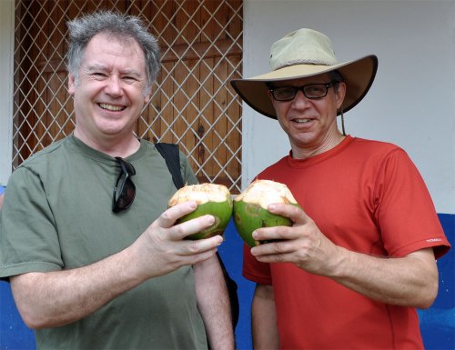OPSEU's Rick Janson and Jeff Arbus toast with coconuts.