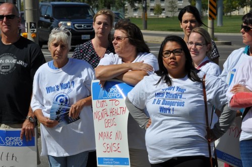 Protesting outside of Kingston's Providence Care September 9.