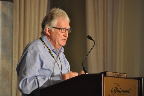 Photograph of professor Dexter Whitfield speaking at the NUPGE privatzation conference.